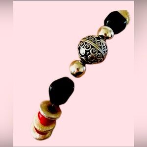 A red and white bracelet